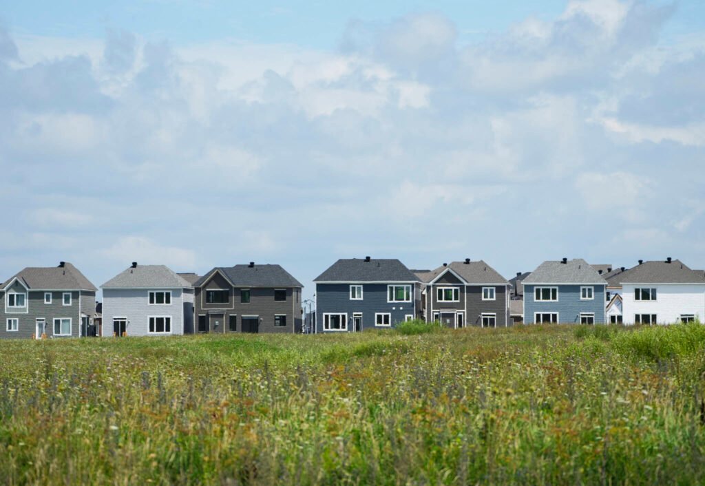 A row of new homes is pictured in Ottawa in August of 2023. The Canadian Real Estate Community land trusts could be a game-changer in Canada’s affordable housing crisis. (The Canadian Press files)
